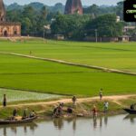 বাংলাদেশের কিশোরগঞ্জ জেলার শীতলক্ষ্যা নদী, সবুজ ধানক্ষেত ও ঐতিহ্যবাহী বরুড়া মঠের বাস্তব দৃশ্য