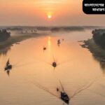 পদ্মা নদীর প্রাকৃতিক দৃশ্য, সূর্যোদয়ের সময় পানি, সবুজ তীর, এবং মাছ ধরা নৌকা।