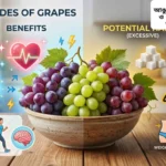 টেবিলের উপর তাজা সবুজ ও বেগুনি আঙুরের গুচ্ছ রাখা আছে, যা স্বাস্থ্যকর ফল হিসেবে পরিচিত।